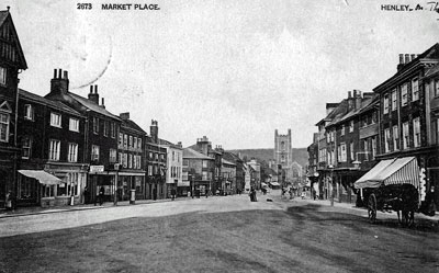Not a car to be seen in this old view of   Market Place   looking towards   Saint Mary's Church  . A couple of building of note on the left; Remenham Dairy and 