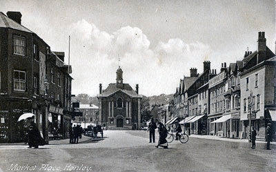 Not much road traffic in this old photo of   Market Place   in Henley looking towards the   Town Hall  .