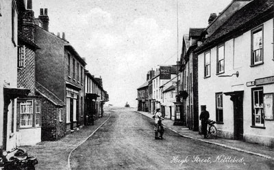 An old view of High Street in the village of Nettlebed near Henley. The road is considerably busier nowadays!