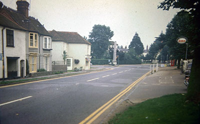 A view taken in the 1960s of   Northfield End   showing the monument now located by   the river   and the old Esso garage.    Photo kindly provided by Roy Sadler.  